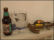 Beer #4. Nutcracker ale, along with my window winterizing tools.
